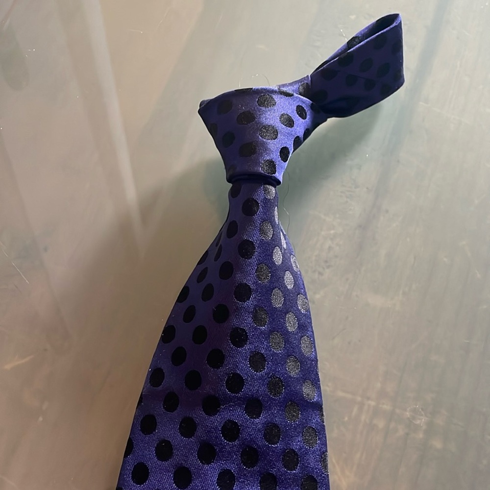 Handsewn tie. Still has tags: purple & black Excellent condition by Ferrell Reed